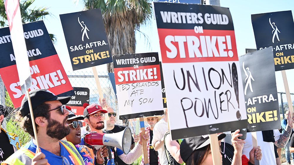 Double Trouble In Hollywood: WGA And SAG-AFTRA Strike Cripples Production Double Trouble In Hollywood: WGA And SAG-AFTRA Strike Cripples Production